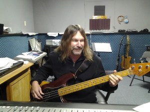 Bill Watson Engineering and playing bass guitar